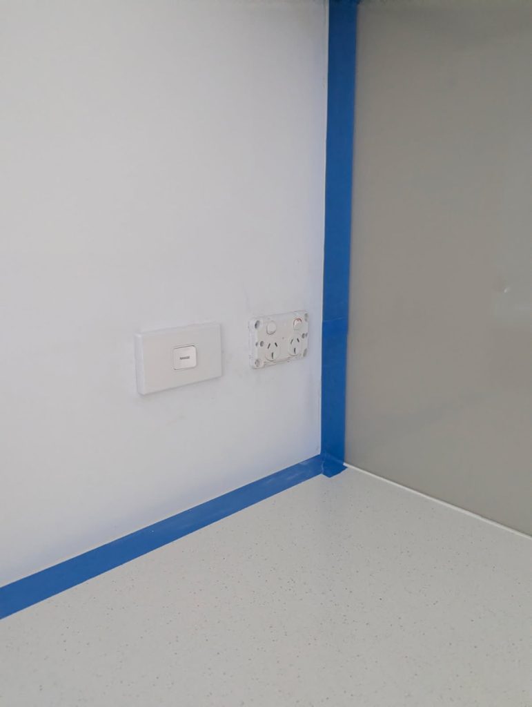 Electrical outlet and isolator switch installed for a new induction cooktop.